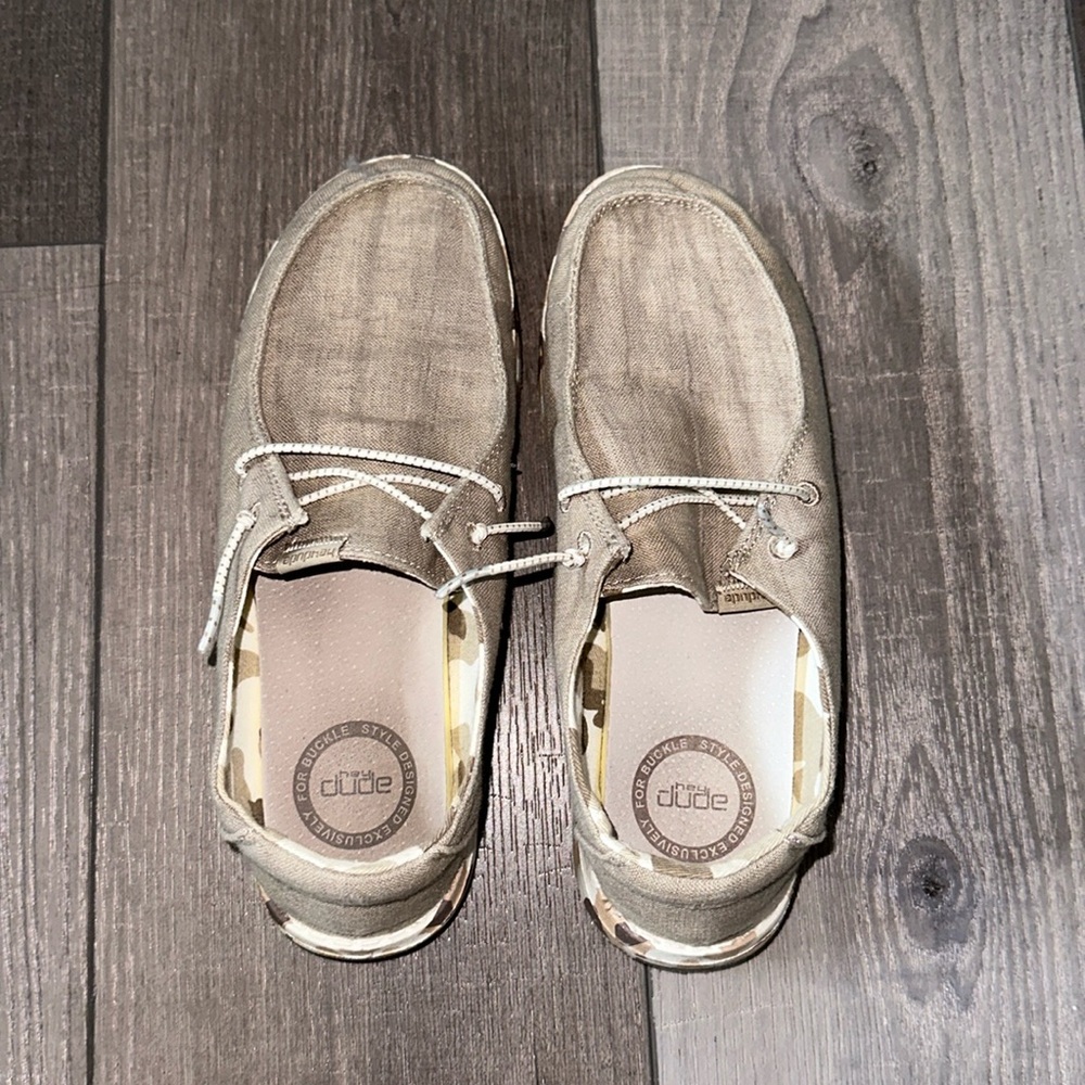 Camo size 7, brown hey dude shoes.